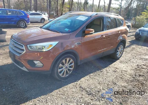 2017 Ford Escape Titanium z USA, uszkodzony, nr VIN 1FMCU9JD1HUA56973